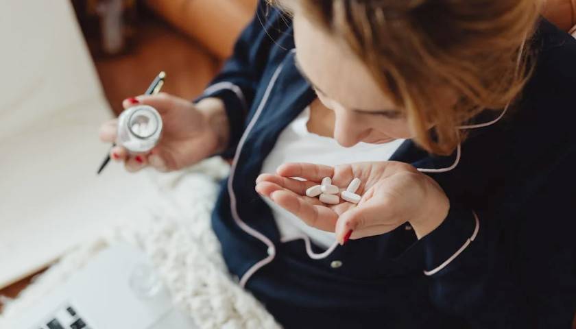 Woman with pills